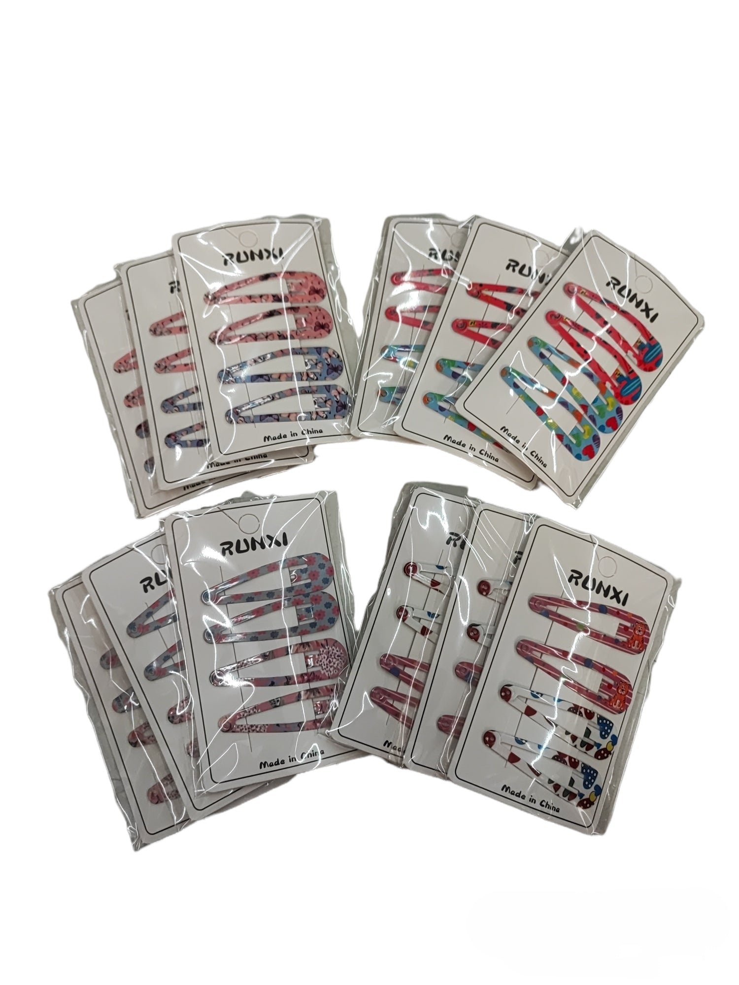 Plaque de 4 Barrettes enfant motif mélange (2x12)