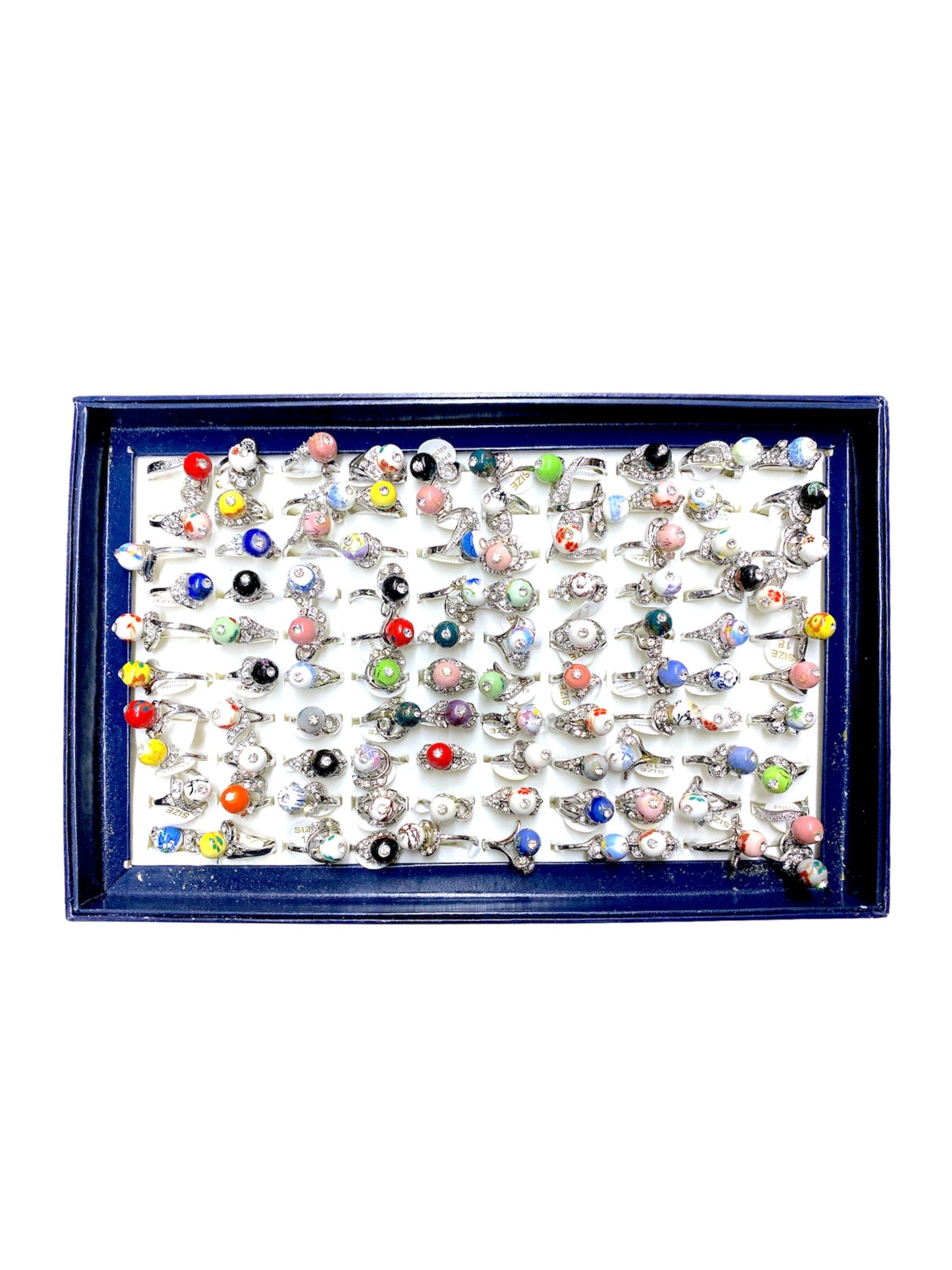 Boîte bagues boules fantaisie femme (x100)