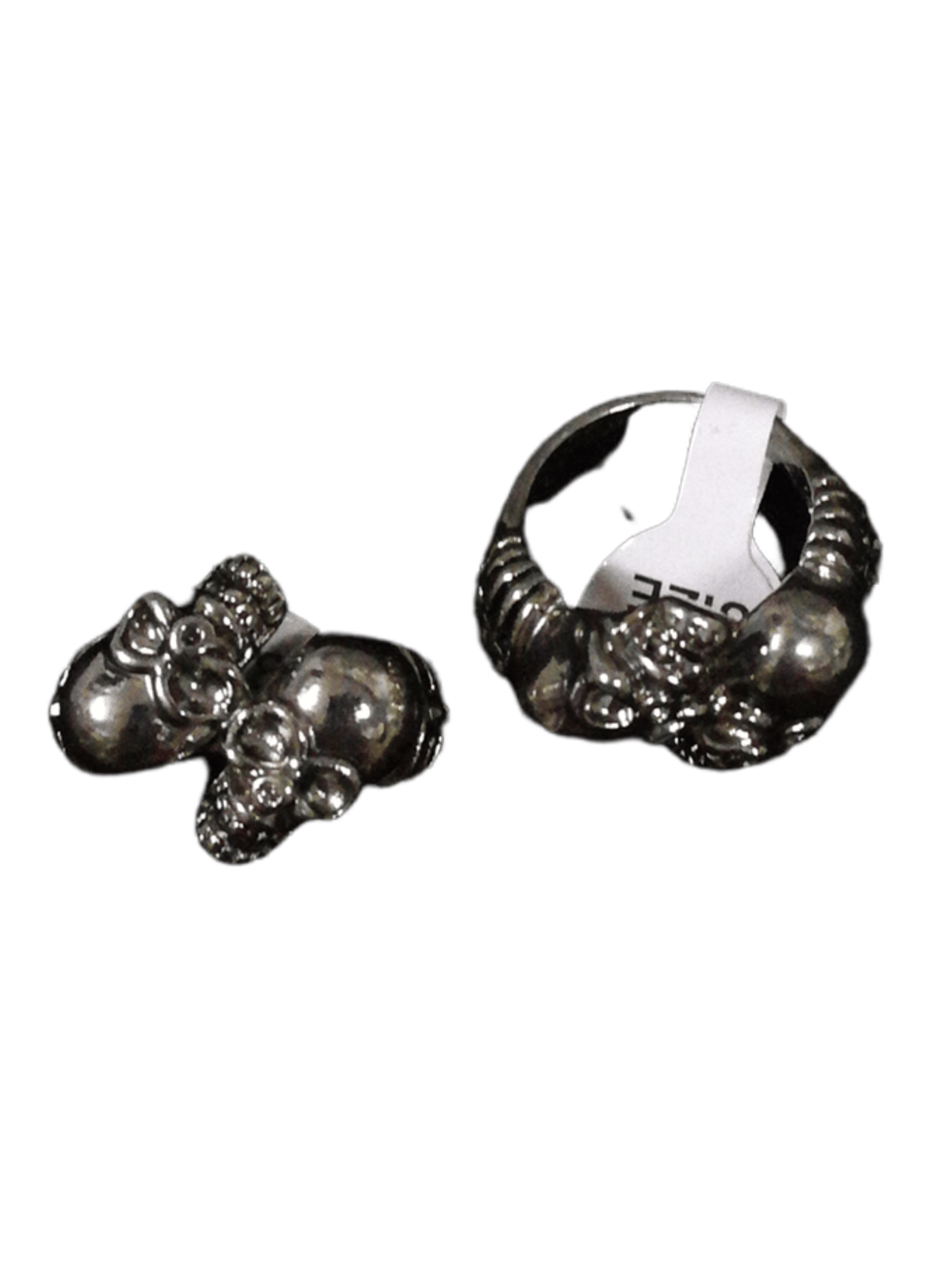 Boîte bagues homme acier inox double tête de mort (x24)    1,50€/unité | Grossiste-pro