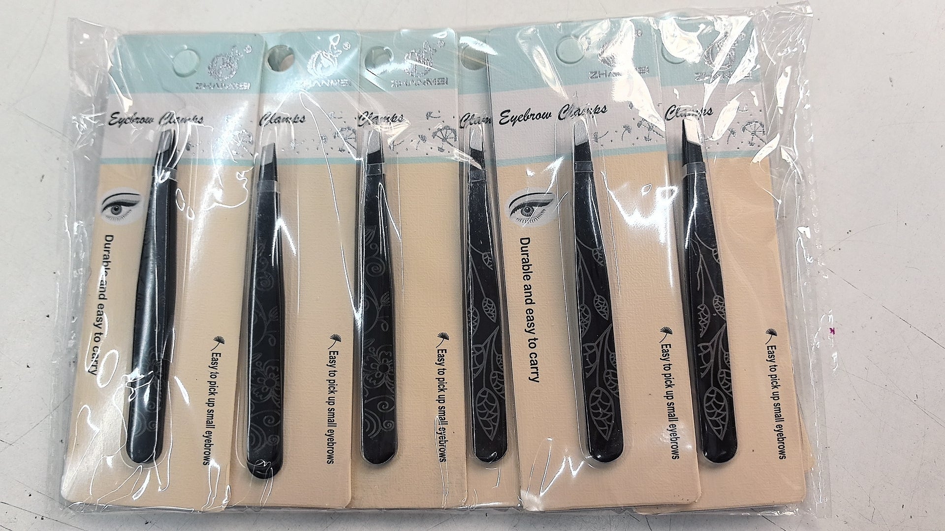 Pinces a sourcils   (x12)